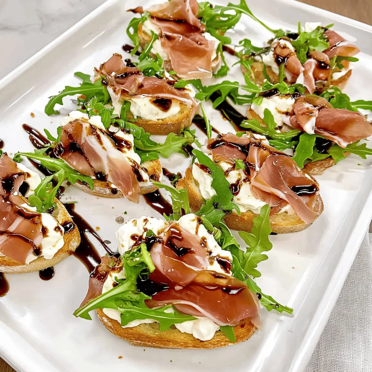 Boursin Prosciutto Arugula Crostini